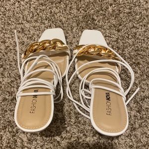 Brand New White High Heels!! Original box available. Size 8 Women’s.